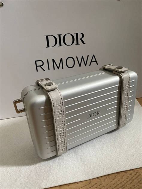 rimowa clutchbag vs dior and rimowa|Dior clutch with hand strap.